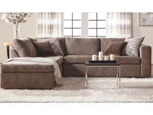 A living room with a couch and table