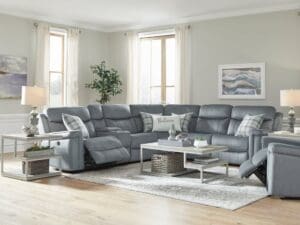 A living room with a couch and a table