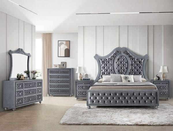 A bedroom with a bed, dresser and mirror.