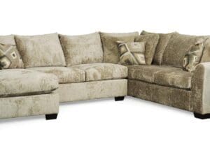 Beige sectional sofa with pillows.