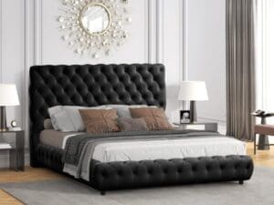 Black tufted velvet upholstered bed frame.